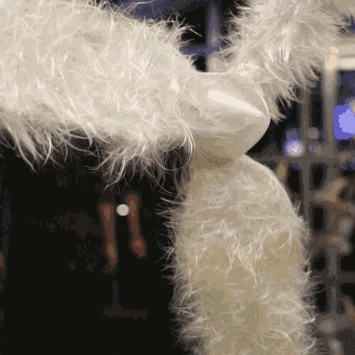 3D printed propeller adorned with hand-placed milkweed plumes