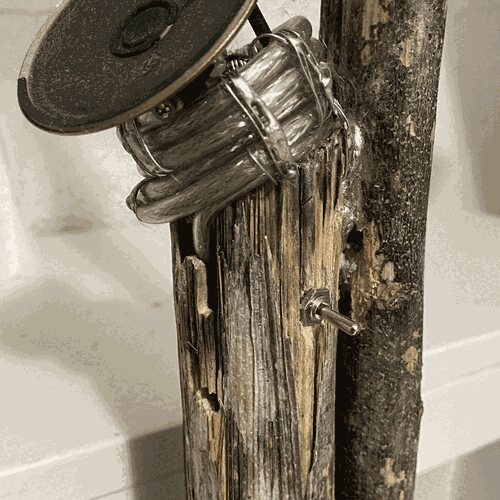 Detail of speaker and switch for grow lights